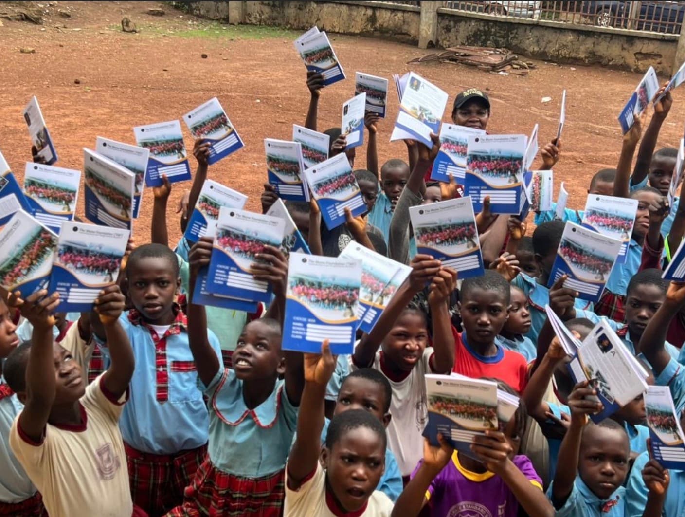 Students receiving school materials